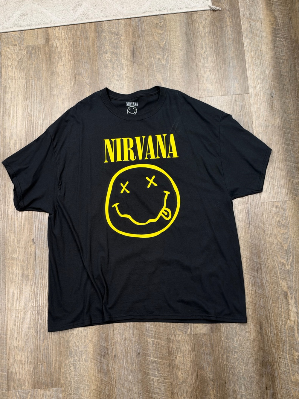 NIRVANA Black Tee with Yellow Smiley Graphic